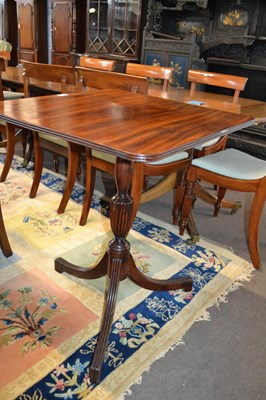 Lot 671 - Georgian mahogany tilt top tripod table with...