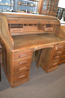 Lot 537 - Early 20th Century Lebus roll top oak twin...