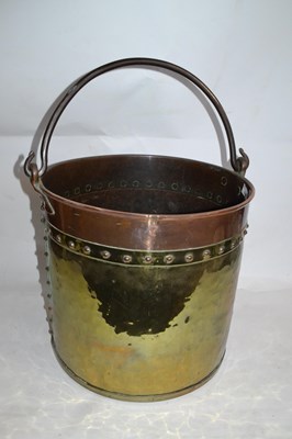 Lot 549 - A large brass and copper coal bucket with...