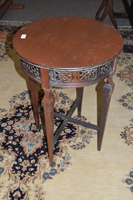 Lot 564 - An Edwardian mahogany lamp table with circular...