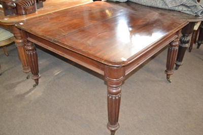 Lot 583 - A Victorian mahogany dining table on fluted...