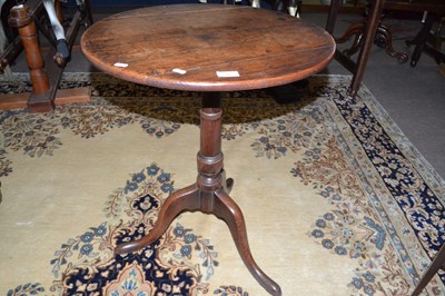 Lot 600 - A Georgian oak wine table with circular top,...