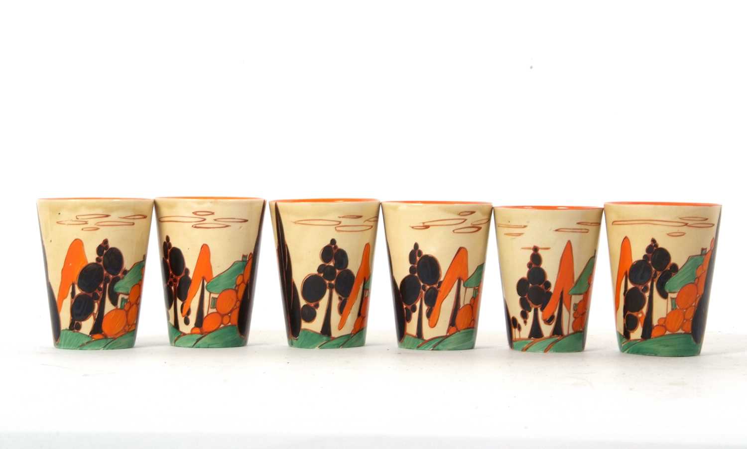 Lot 41 - Set of Six Clarice Cliff Fantasque Bizzare Beakers with Trees and House Design