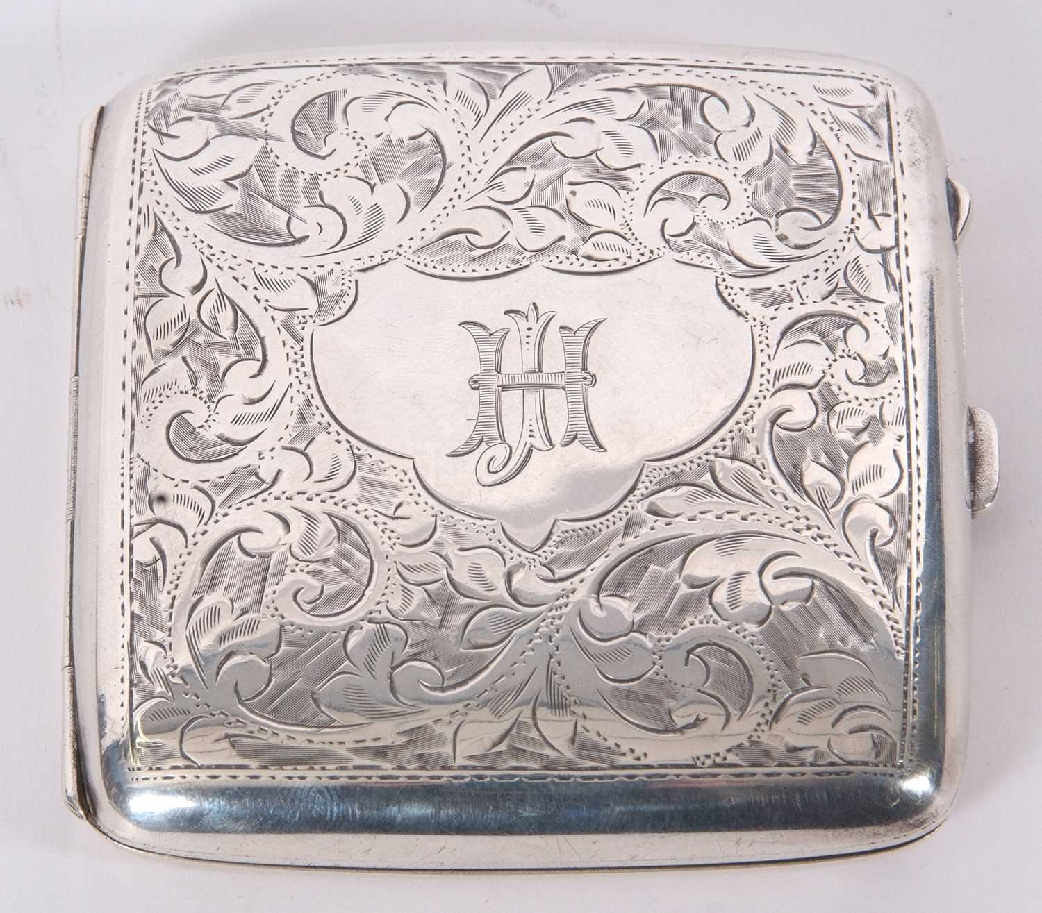 Lot 5 - George V silver cigarette case of slightly...