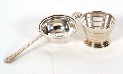 Lot 25 - An Art Deco silver tea strainer and bowl, both...