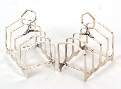 Lot 28 - Pair of Art Deco silver toast racks of angular...