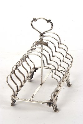 Lot 29 - A large Victorian silver toast rack having six...