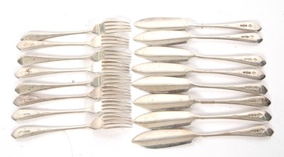 Lot 37 - Eight pairs of George VI silver fish eaters,...