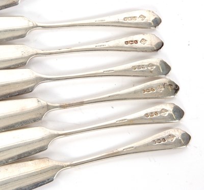 Lot 37 - Eight pairs of George VI silver fish eaters,...