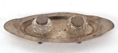 Lot 60 - An Edwardian silver ink stand boat shaped and...