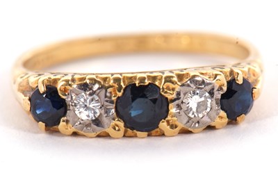 Lot 22 - An 18ct sapphire and diamond ring, the three...