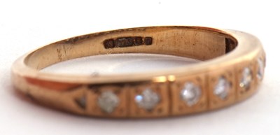 Lot 12 - A 9ct diamond ring, the half hoop set with...