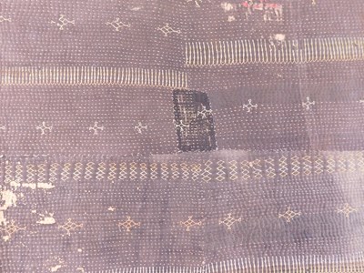 Lot 198 - Two Saami quilts, approx. 55 x 200cm & 110 x...