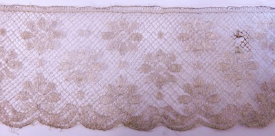 Lot 195 - A length of Victorian machine made silver lace,...