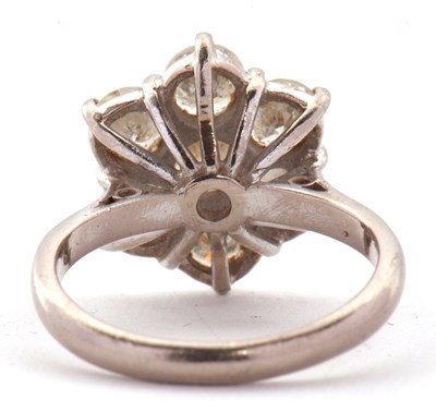 Lot 373 - A diamond flowerhead cluster ring, the central...