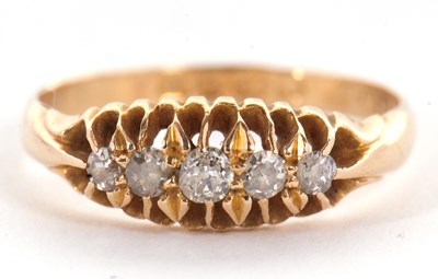 Lot 21 - An 18ct diamond ring, the five old mine cut...