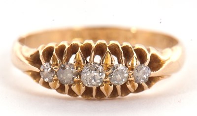 Lot 21 - An 18ct diamond ring, the five old mine cut...