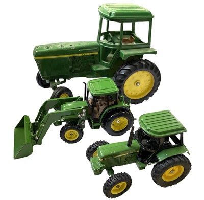 Lot 87 - Two die-cast John Deere tractor models, plus...