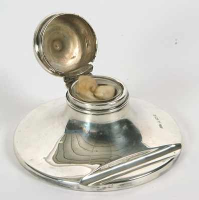 Lot 3 - An Edwardian silver capstan ink well with...