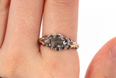 Lot 43 - A rose cut diamond ring, the central rose cut...