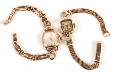 Lot 201 - A lady's 9ct Tissot wristwatch with 9ct strap,...