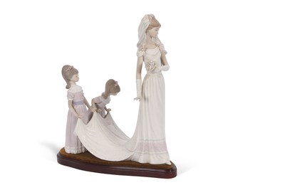 Lot 23 - A Lladro group of a bride with bridesmaids on...