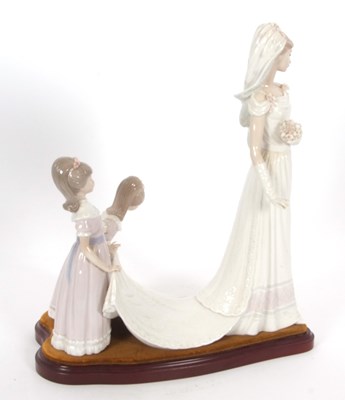 Lot 23 - A Lladro group of a bride with bridesmaids on...