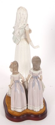 Lot 23 - A Lladro group of a bride with bridesmaids on...