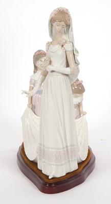 Lot 23 - A Lladro group of a bride with bridesmaids on...