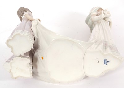 Lot 23 - A Lladro group of a bride with bridesmaids on...