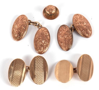 Lot 203 - A pair of 9ct oval cufflinks and a matching...
