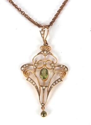 Lot 124 - An Edwardian peridot and seed pearl pendant,...