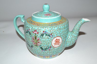 Lot 619 - A Chinese porcelain teapot, late 19th Century,...