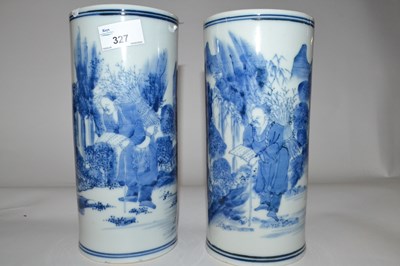 Lot 327 - A pair of Chinese porcelain cylindrical vases...