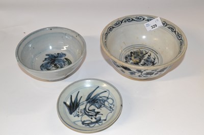 Lot 329 - A group of two Chinese pottery bowls and a...