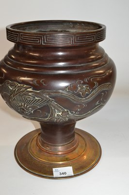 Lot 340 - A Japanese bronze vase and stand with raised...