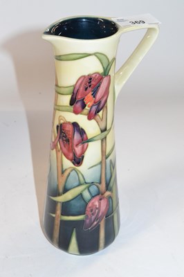 Lot 369 - A Moorcroft ewer within the Cricklade pattern...