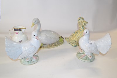 Lot 380 - Pair of ceramic pigeons by Brenda Dennis...