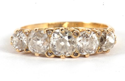 Lot 33 - An 18ct five stone diamond ring, the five...