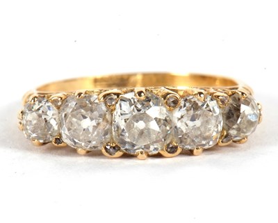 Lot 33 - An 18ct five stone diamond ring, the five...
