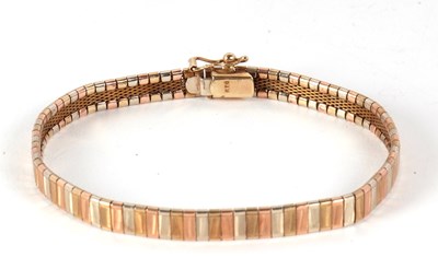 Lot 161 - A 9ct tri-colour bracelet, the 6mm wide...