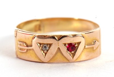 Lot 34 - A ruby and diamond double heart ring, the...