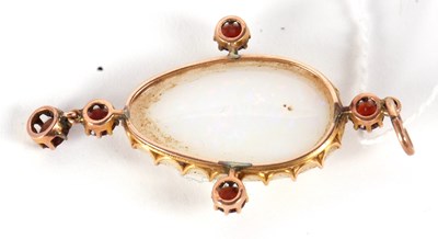 Lot 75 - An opal and garnet pendant, the pear shape...