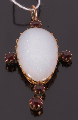 Lot 75 - An opal and garnet pendant, the pear shape...