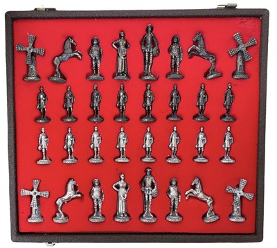 Lot 263 - A metal chess set, formed as characters from...