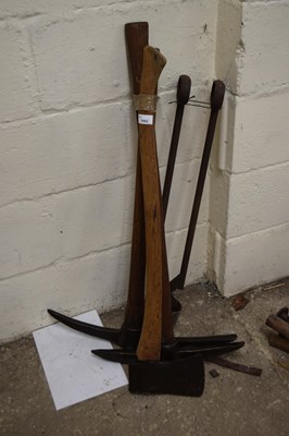 Lot 1002 - Two pick axes and a felling axe