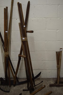 Lot 1008 - Bundle of various tools to include a scythe,...