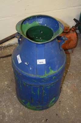 Lot 1015 - A blue painted milk churn