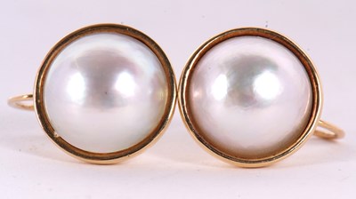 Lot 96 - A pair of cultured mabe pearl earrings, the...