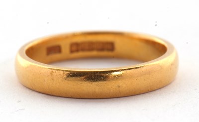 Lot 145 - A 22ct wedding band, hallmarked Birmingham...